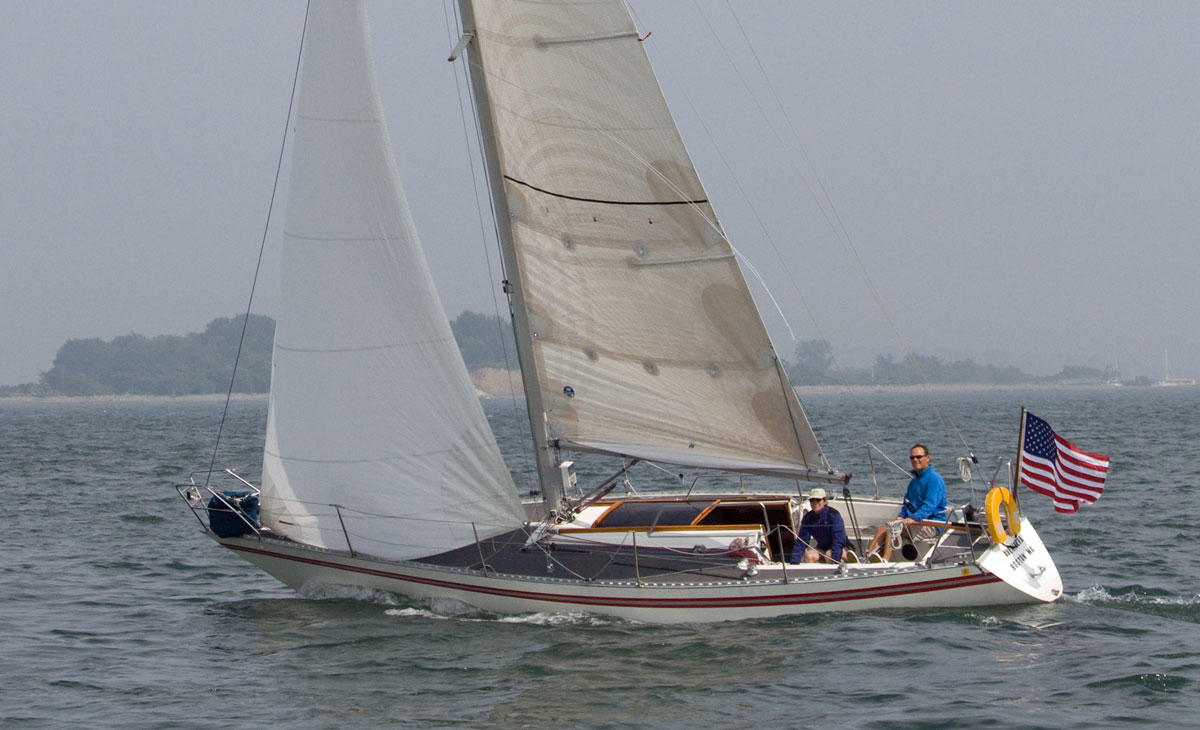 An Aphrodite 101 sailboat under full sail