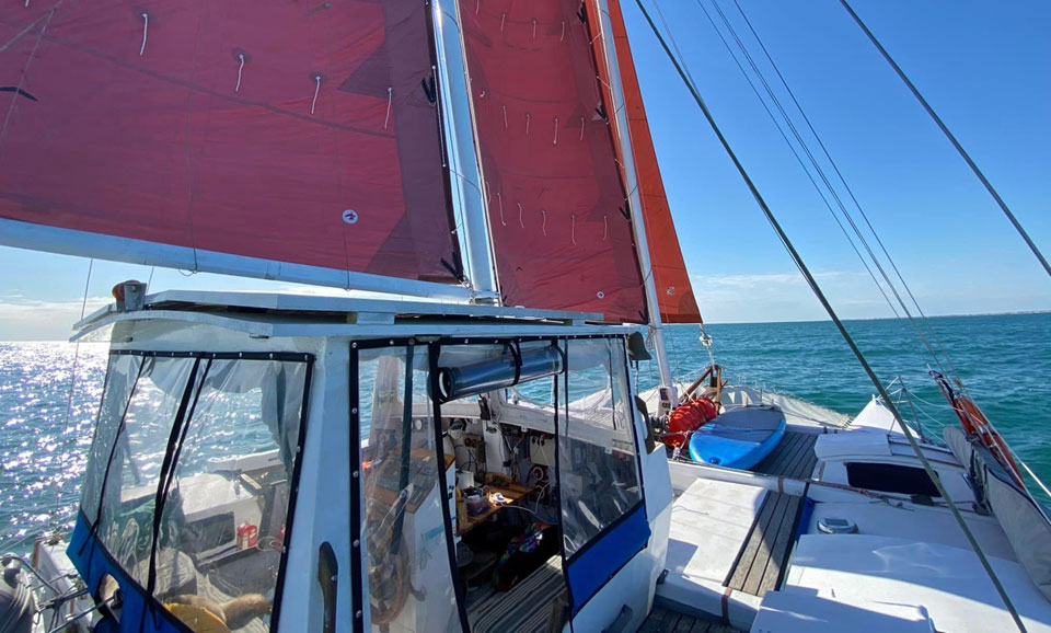 A Wharram Tiki 38 reaching at 9 knots