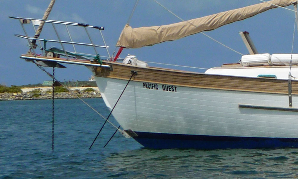 This cutter-rigged monohull needs to have its anchor snubber on a bridle to avoid chafe on the bobstay.